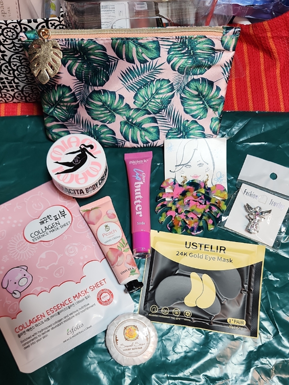 Tropical Leaf Cosmetic Pouch with Assorted Beauty Items